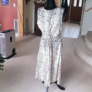 Snake print polyester dress by Aqua. Size large.